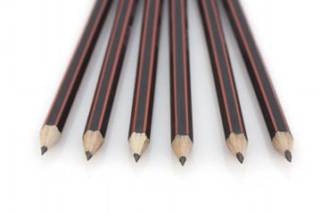 Graphite pencils on white background