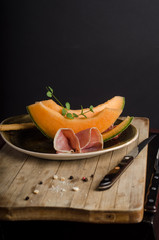 Orange melon with prosciutto
