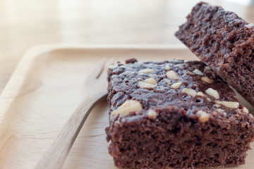 Delicious Brownie pieces in wooden plate