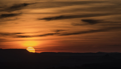 Fototapeta na wymiar Sunset in national park from hill