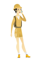 Traveler talking on a mobile phone.