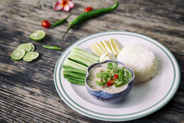 Tuna in Dipping Sauce With Rice on wooden background