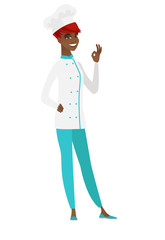 Smiling chef cook showing ok sign.