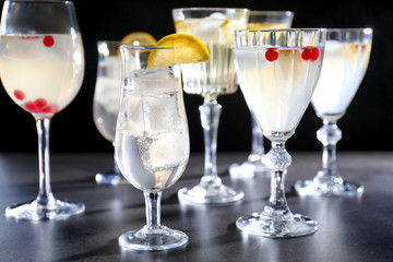Different refreshing cocktails on table