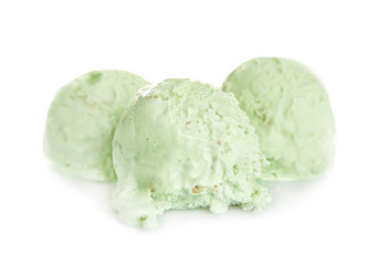 Tasty pistachio ice cream on white background