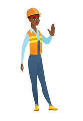 African-american builder showing stop hand gesture