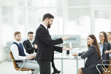  senior Manager of the company holds a working meeting with business team in modern office
