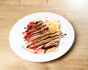 Pizza slices spread on a plate on a table in a restaurant