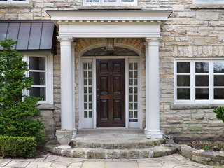 Fototapeta na wymiar house front door with portico entrance
