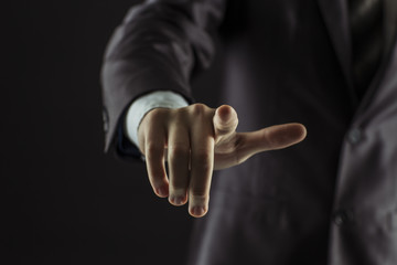 concept of success in business:businessman pointing his finger forward