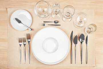 Beautiful table setting with white plates