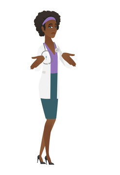 African confused doctor shrugging shoulders.