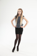 portrait of a young woman - administrator in a stylish suit on a