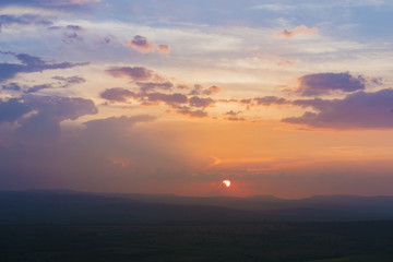 Fototapeta na wymiar beautiful sunset with mountain