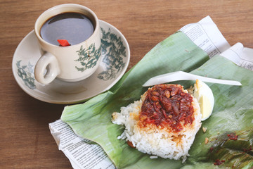 Breakfast set of coffee and nasi lemak, popular in Malaysian and Singaporean coffeeshops