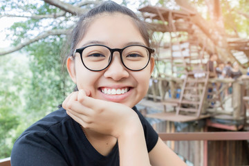 Close up portrait of happy Asian girl