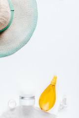 Woman cosmetic set sun protection lotion white background top view mock up