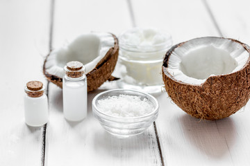 Fototapeta na wymiar organic cosmetics concept with coconut on table background