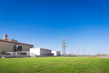 Fototapeta na wymiar power plant in country in blue sky