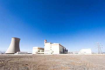 power plant in country in blue sky
