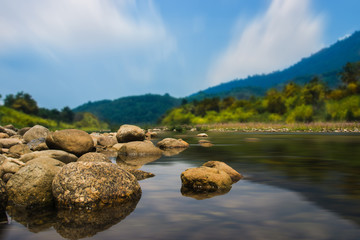 Brook and rocks in the mountains at Kiriwong village.