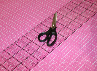 scissors and work surface in a tailoring workshop