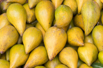background with fresh Sapodillas India in market