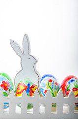 Easter composition with colorful Easter eggs and bunny