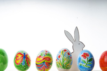 Easter composition with colorful Easter eggs and rabbit