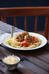 Homemade sauce and meatballs with pasta.