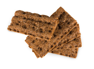 Slice of whole grain crispy rye bread isolated on white