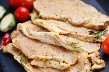 Raw marinated pork meat and vegetables 