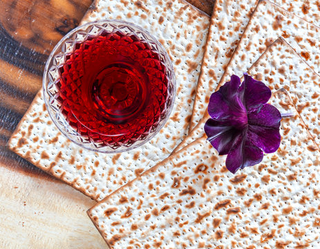 Tradition food unleavened bread (matzoth) and red wine for celebration of Jewish Passower - pesakh