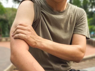 Foto op Canvas Male arm muscle pain or injury isolated , healthy concept. © thebigland45