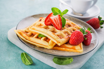 Homemade waffles with strawberries