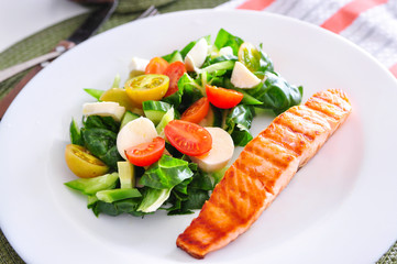 Salmon with vegetable salad