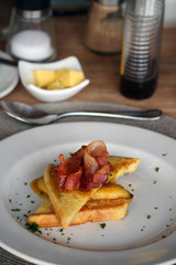 French toast with bannana, bacon and syrup 