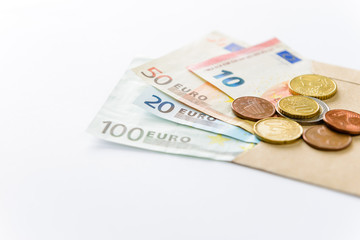Euro money. banknotes and coins on white background