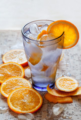 Fruit ice cubes with soda and fresh fruits