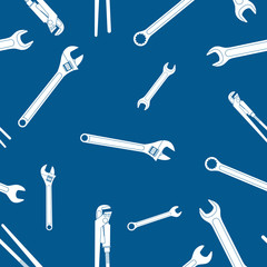 White wrench icons on blue background. Industrial seamless texture