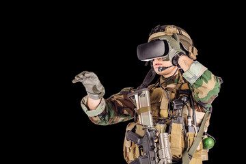 Fototapeta premium soldier wearing virtual reality glasses.