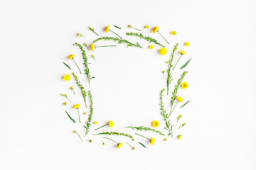 Flowers composition. Frame made of yellow flowers on white background. Flat lay, top view