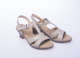 shoe. Brown colour fashion woman shoes on a background.