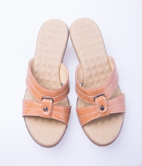 shoe. Brown colour fashion woman shoes on a background.