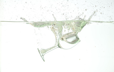 glass splashing into water