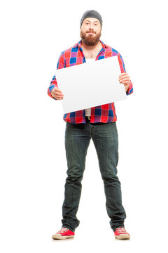 Your text here. Cheerful bearded man holding blank and smiling at camera while standing isolated on white background