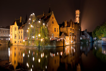 Fototapeta na wymiar Historic Medieval City of Bruges with River Canal at Dusk, Belgium