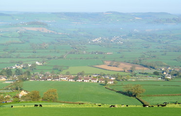 Fototapeta na wymiar Panoramic view over Axe Valley, Devon on a foggy spring morning