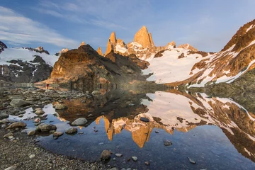Wall murals Fitz Roy Fitz Roy mountain and lake at red sunrise