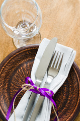 Festive Table Setting With Napkin and Cutlery.